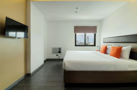 30%Off Relaxing Experience in an Executive King or Twin Room for 2 Adults and 2 Kids , Use of Overlooking Rooftop Pool and Gym at Privato Hotel Makati Starting at P1955 instead of P2800