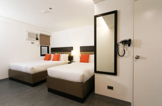 30%Off Relaxing Experience in an Executive King or Twin Room for 2 Adults and 2 Kids , Use of Overlooking Rooftop Pool and Gym at Privato Hotel Makati Starting at P1955 instead of P2800