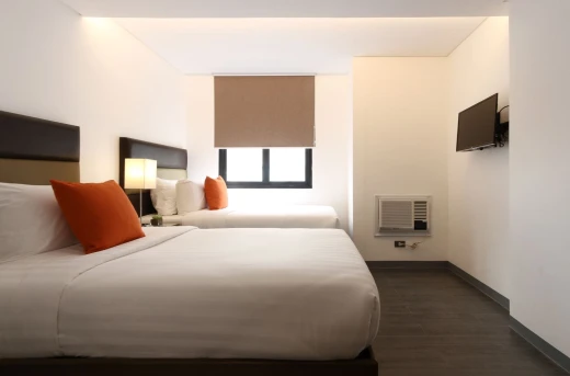 30%Off Relaxing Experience in an Executive King or Twin Room for 2 Adults and 2 Kids , Use of Overlooking Rooftop Pool and Gym at Privato Hotel Makati Starting at P1955 instead of P2800