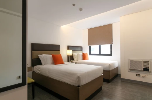 30%Off Relaxing Experience in an Executive King or Twin Room for 2 Adults and 2 Kids , Use of Overlooking Rooftop Pool and Gym at Privato Hotel Makati Starting at P1955 instead of P2800