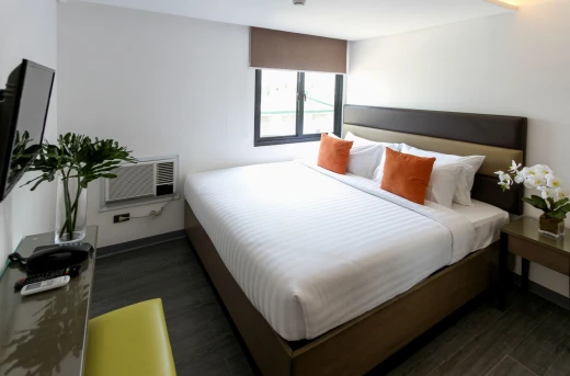30%Off Relaxing Experience in an Executive King or Twin Room for 2 Adults and 2 Kids , Use of Overlooking Rooftop Pool and Gym at Privato Hotel Makati Starting at P1955 instead of P2800