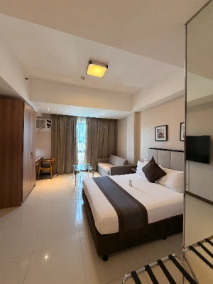 39%Off Ace Hotel Room Accomodation for 2 Adults & 2 Kids with Buffet Breakfast & Ace Water Spa Tickets - Deluxe or Junior Suite Room